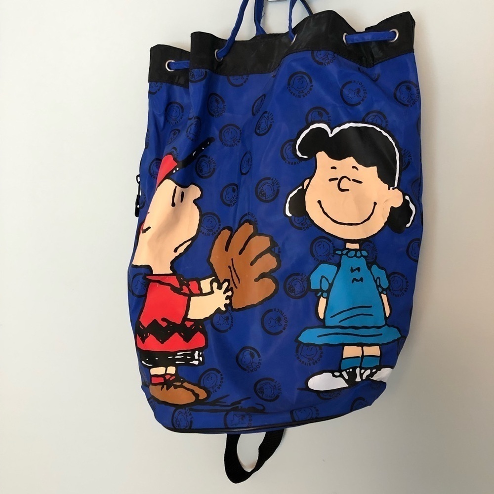 Peanuts plastic drawstring Backpack Tote‎ ft. Charlie Brown and Lucy.